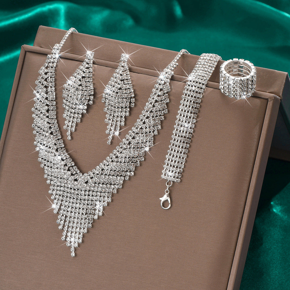 Sophisticated and moody. This works perfectly for prom, evening weddings, or black-tie events where the jewelry needs to pop against dark evening wear.