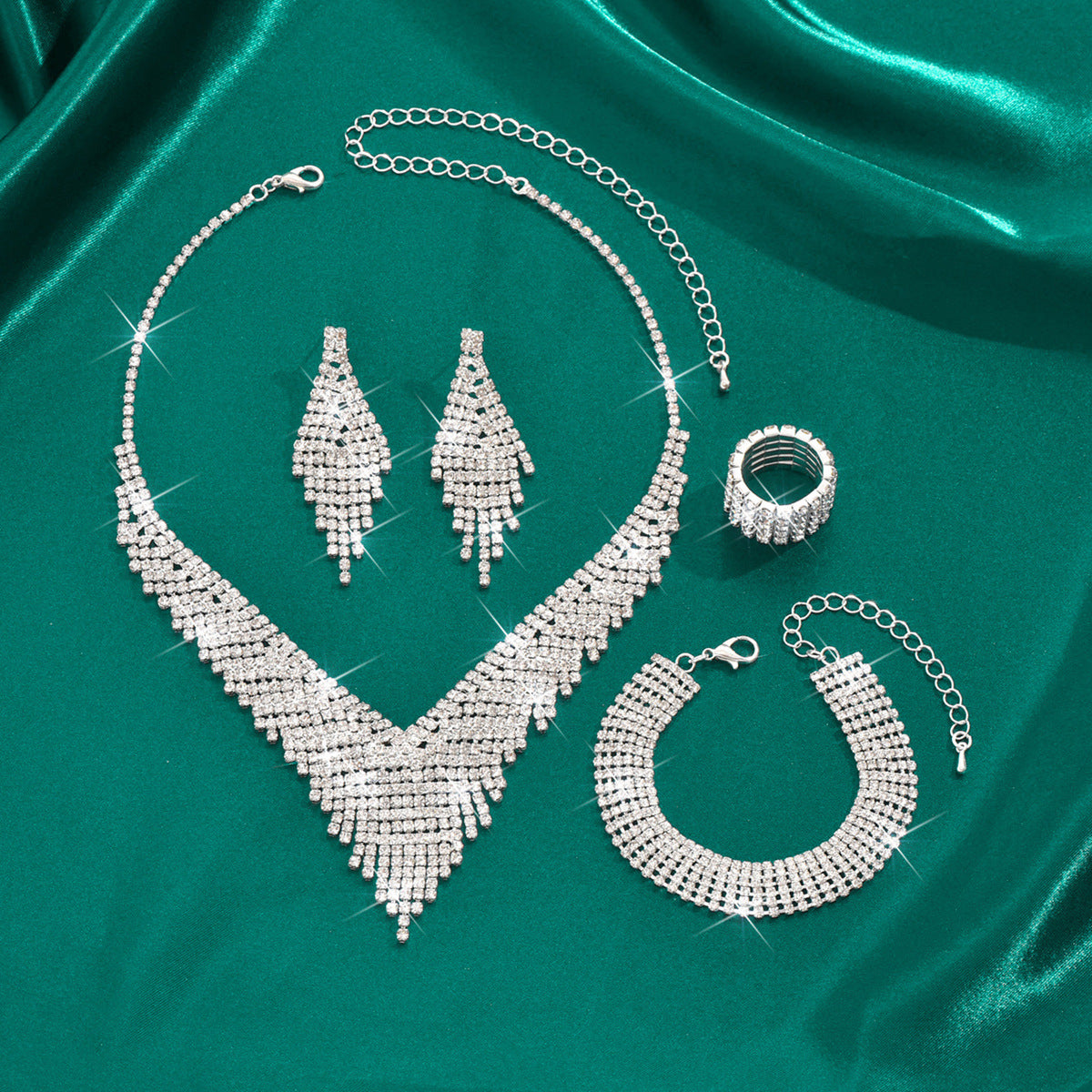 Describes the movement. The way the necklace and earrings taper down looks like flowing water; this name highlights that elegant, cascading visual.